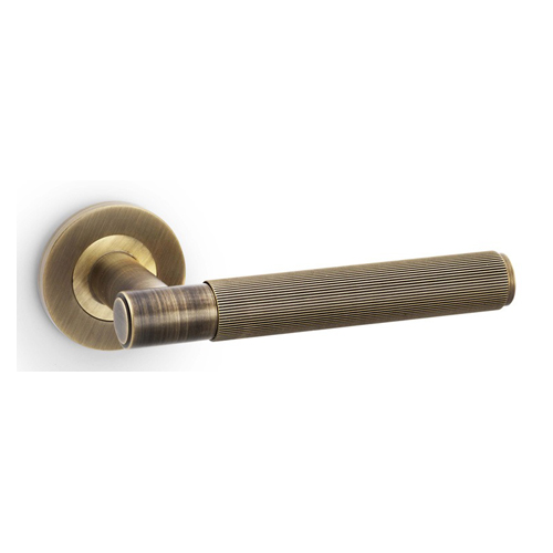 Alexander & Wilks AW222AB Spitfire Reeded Lever On Round Rose - Antique Brass (LEAD TIME: 2-3 DAYS)